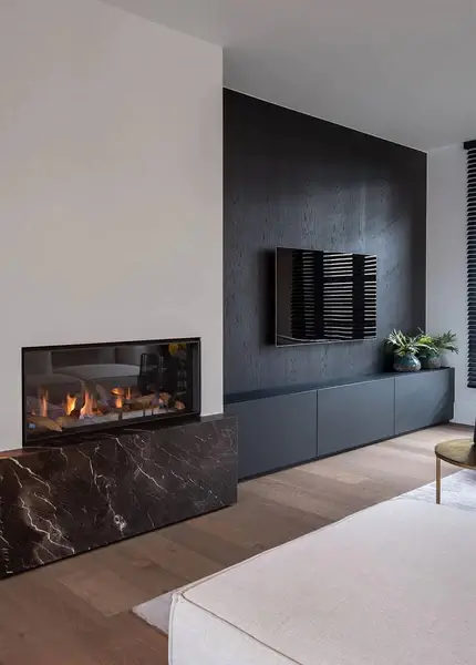 Minimalist living room with a modern fireplace